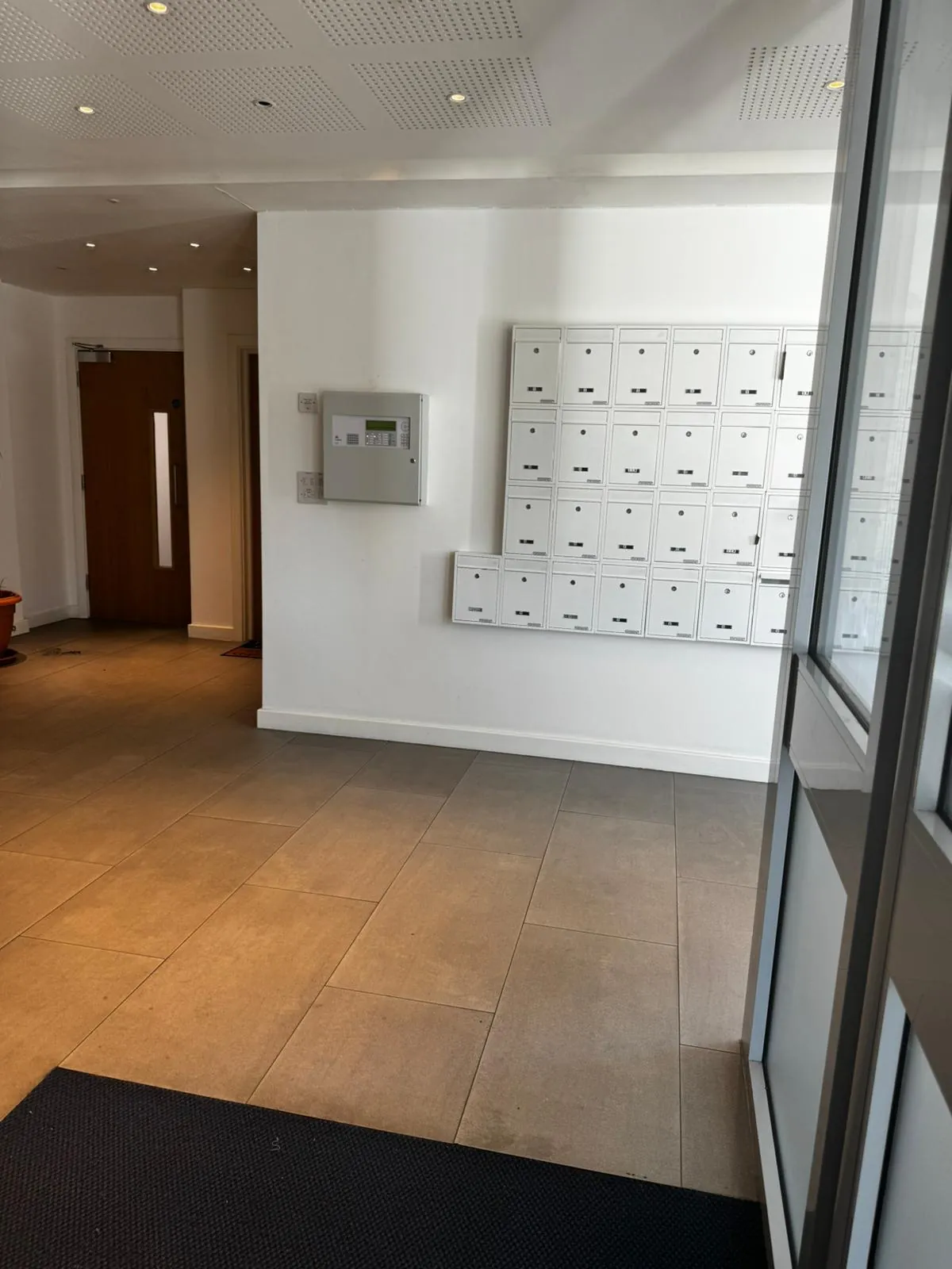 Communal entrance cleaned by L E Cleaning in London